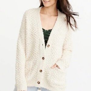Abercrombie & Fitch Boucle Cardigan Sweater
Cozy Cream Button-Up Women Sweater